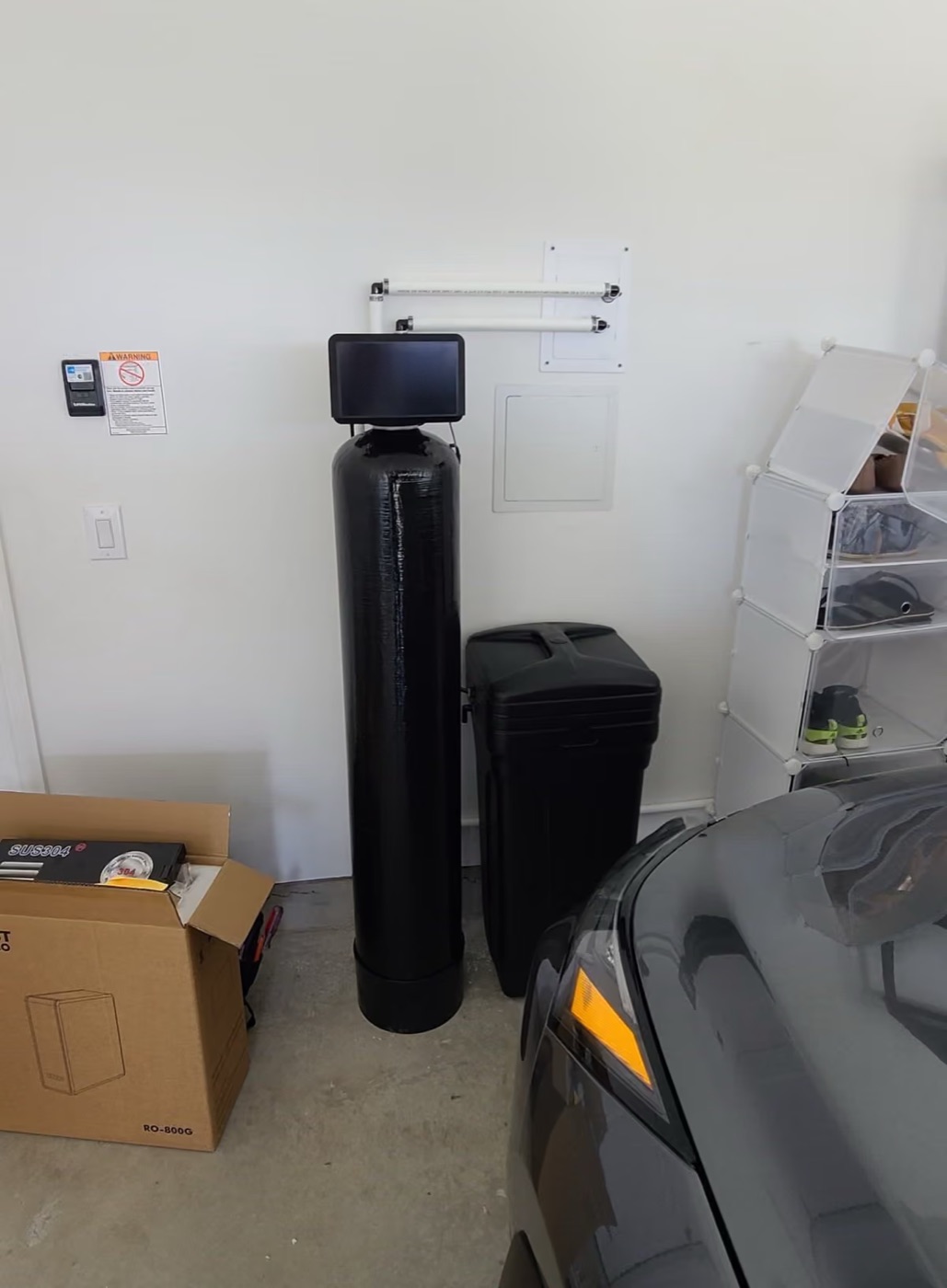 Softener and brine tank with the drain line run to the wall 2